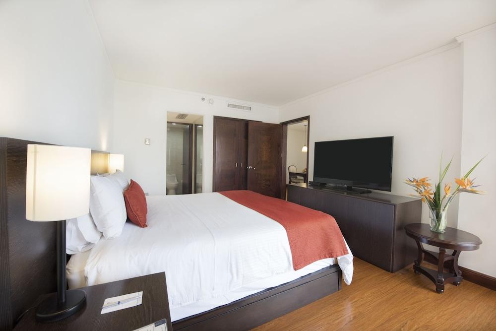 Hotel Dann Carlton Belfort Medellín Exteriör bild A bedroom at the hotel
