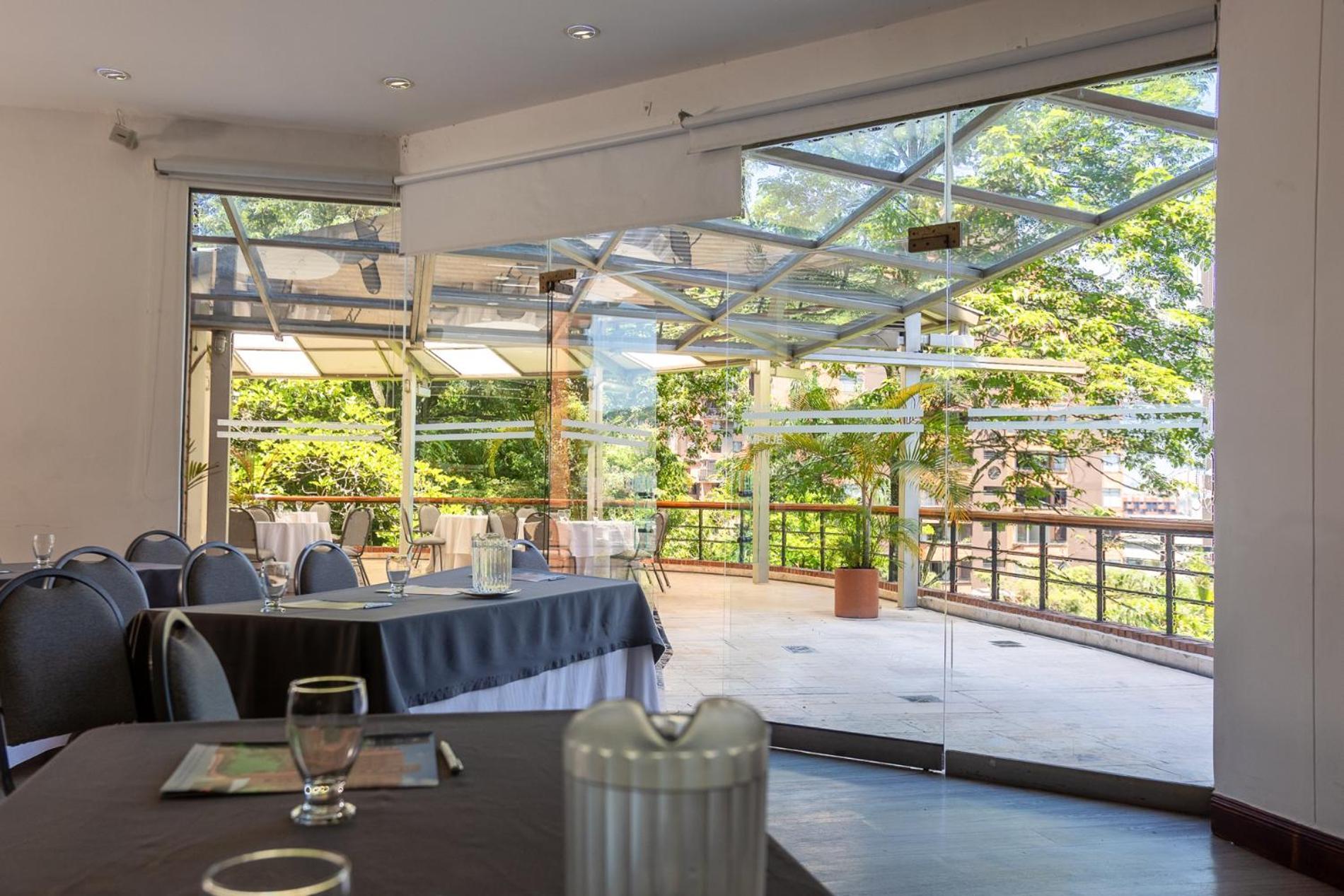 Hotel Dann Carlton Belfort Medellín Exteriör bild The restaurant